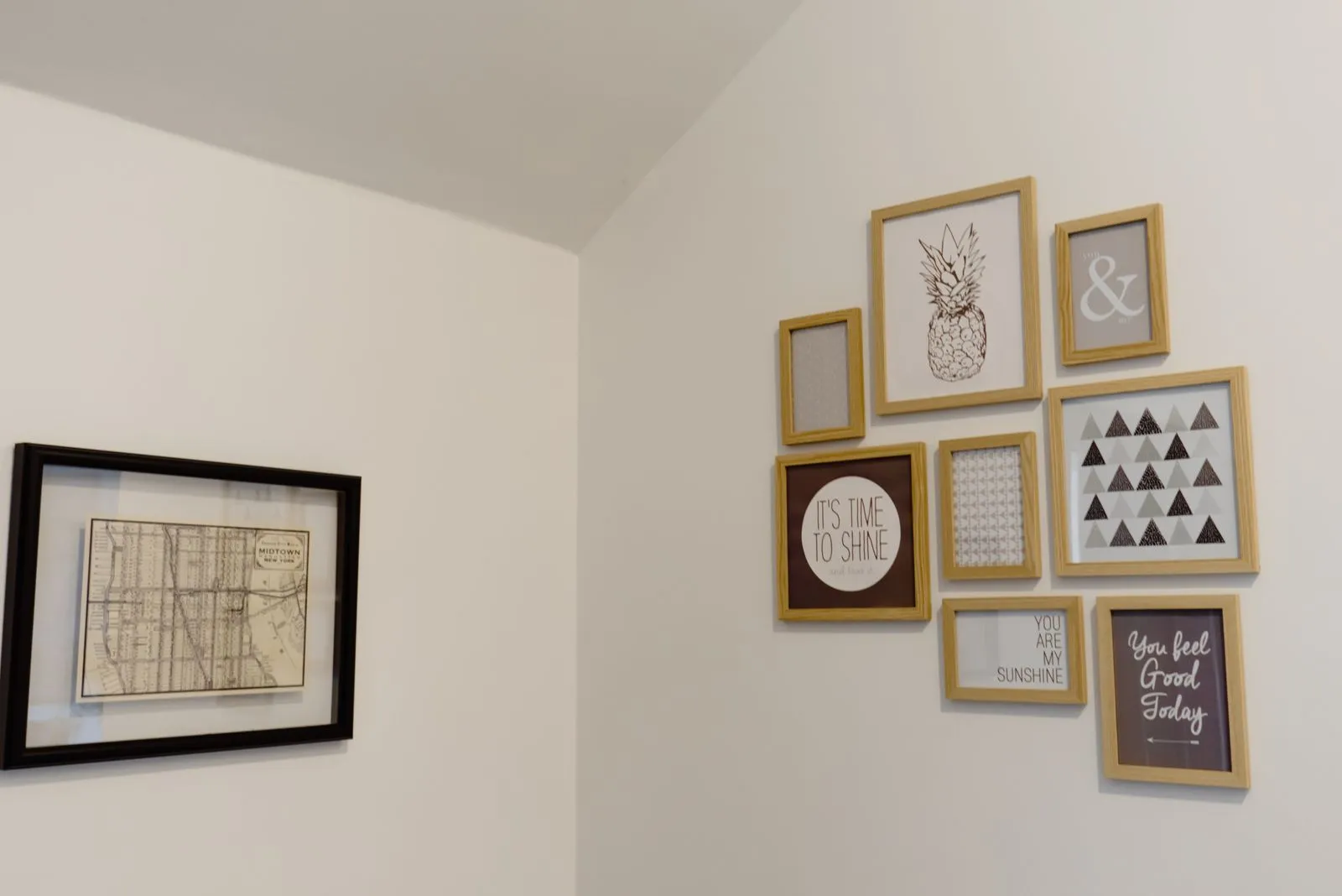 A chic arrangement of picture frames on a white wall adds a modern touch to your space.